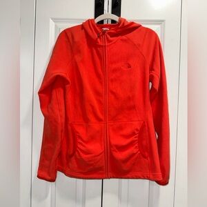 The North Face women’s orange zip up jacket